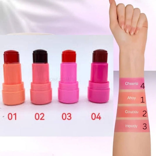 Four lip balm sticks with different shades and a hand swatching them on a white background.