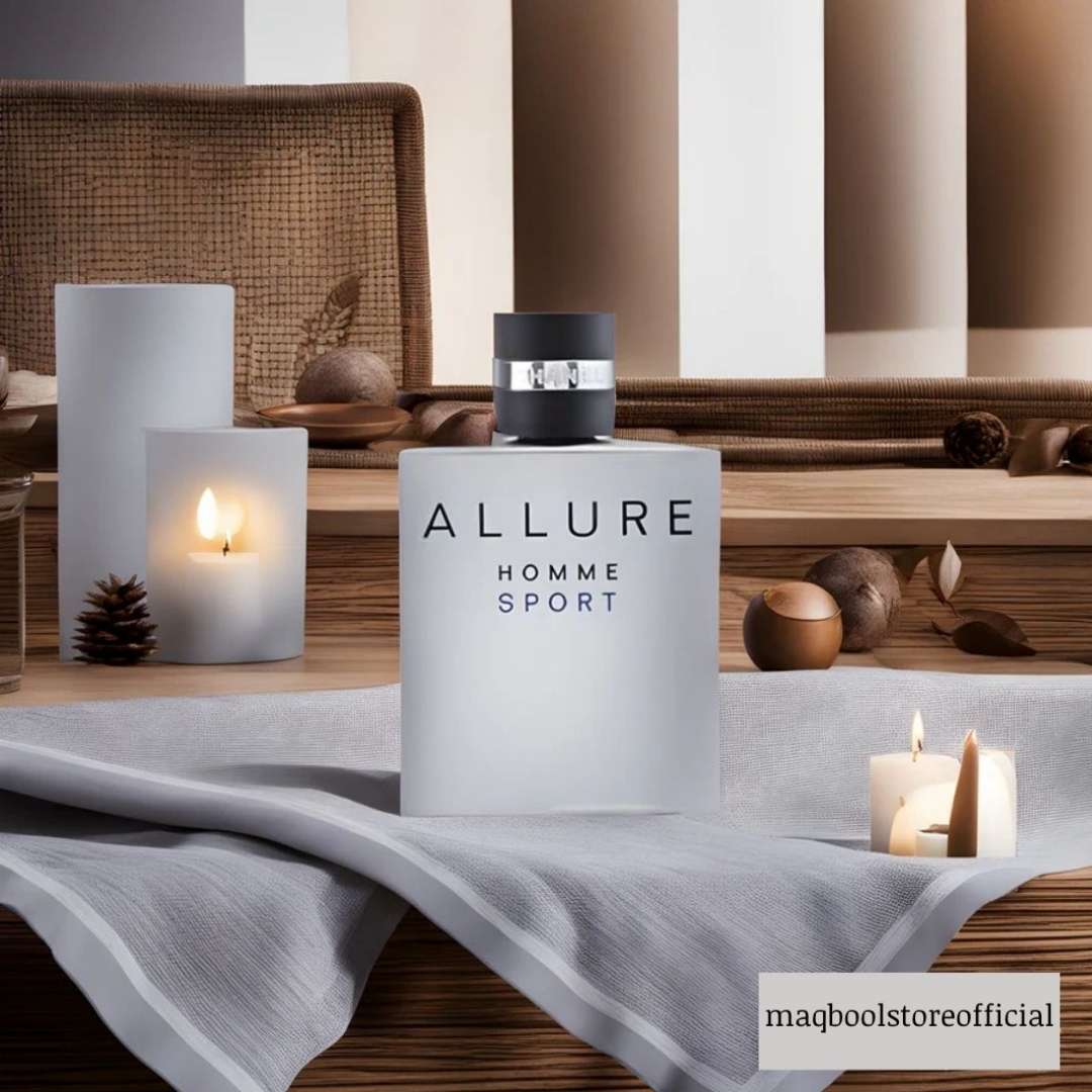 Allure Homme Sport perfume bottle on a table with candles and decorative items.