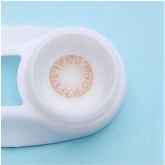 comfort soft Contact lens with a white case on a light blue background at best price online sale in Pakistan