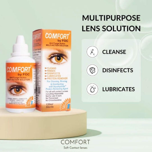 Comfort multipurpose lens solution bottle and box on a light green background