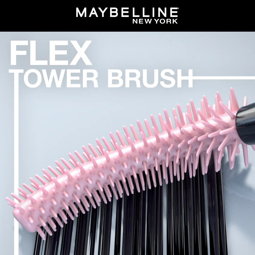 Maybelline New York Flex Tower Brush with pink bristle head and black handle on a light gray background