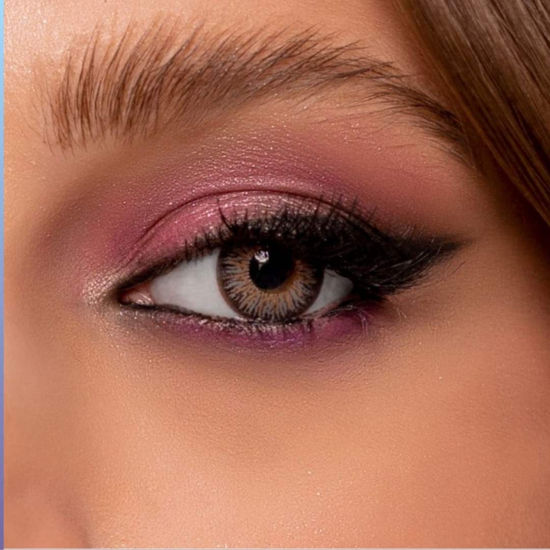 Close-up of a eye with purple NK Gray Contact Lenses.