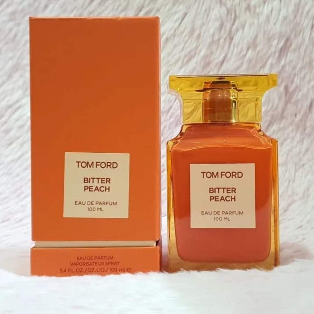 Tom Ford Bitter Peach perfume bottle and packaging on a textured white background at best price online in Pakistan