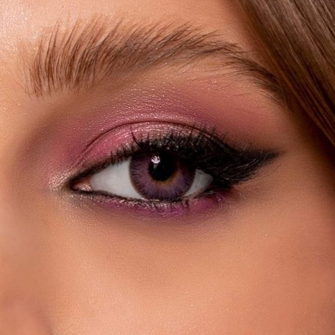 Close-up of a woman's eye with Violet NK contact lens