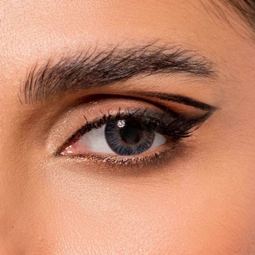 Close-up of a person's eye with bio luc gray soft lenses