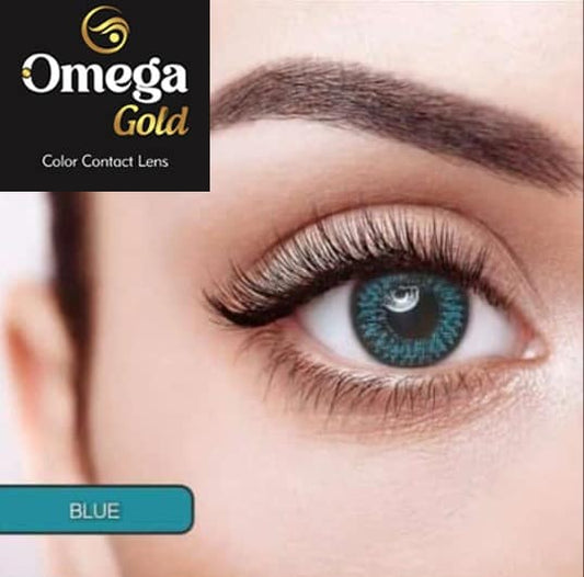 Close-up of an eye wearing blue contact lenses with Omega Gold branding.