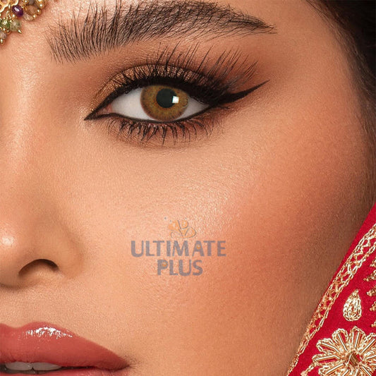 Close-up of an eye wearing brown contact lenses of ULTIMATE PLUS 3-in-1 colour  Bridal Eye lenses