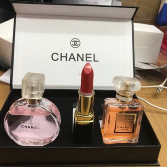 Chanel perfume and lipstick set on a black tray with Chanel box in the background at best price online in Pakistan