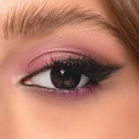 Close-up of a woman's eye with comfort black nk lenses