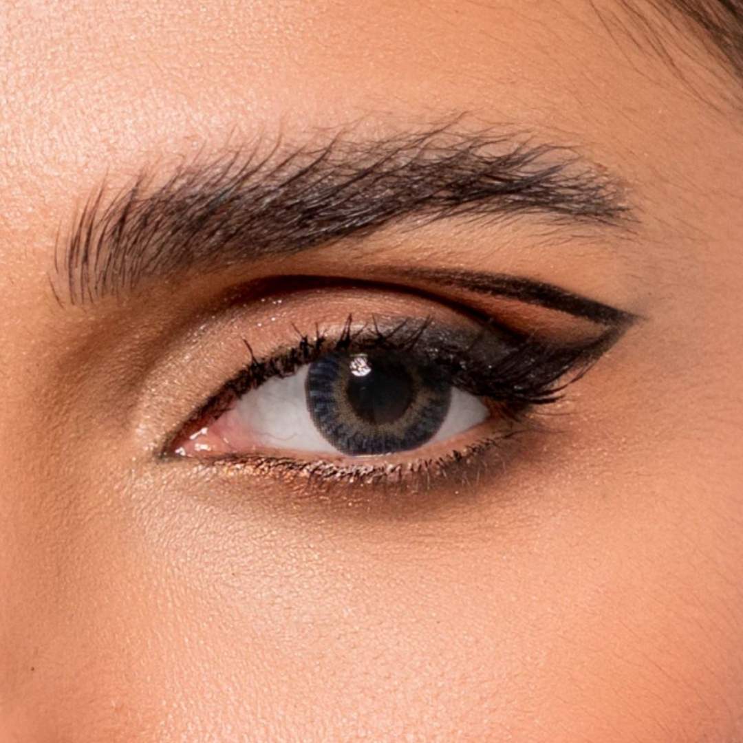 Close-up of a person's eye with  comfort contact lenses BIO LUK sky blue color