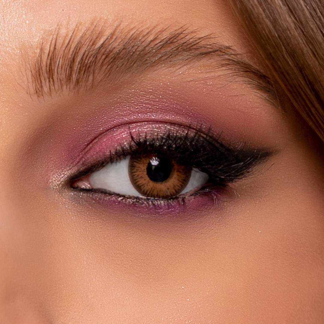 Close-up of a person's eye with  comfort contact lenses NK brown