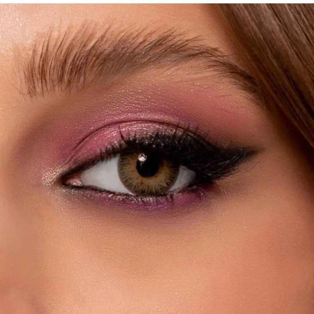 close up of girl wearing comfort contact lenses NK green 