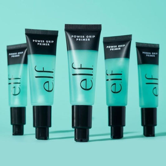 Multiple tubes of e.l.f. Power Grip Primer on a teal background at best price online sale in Pakistan
