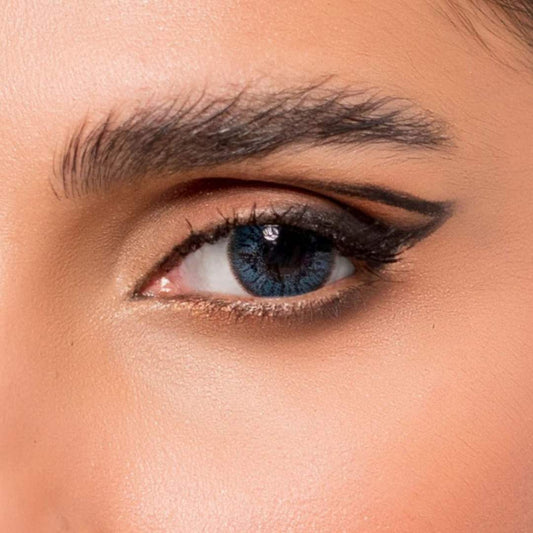 Close-up of a woman's eye with jewel aqua blue lenses at best price online sale in Pakistan