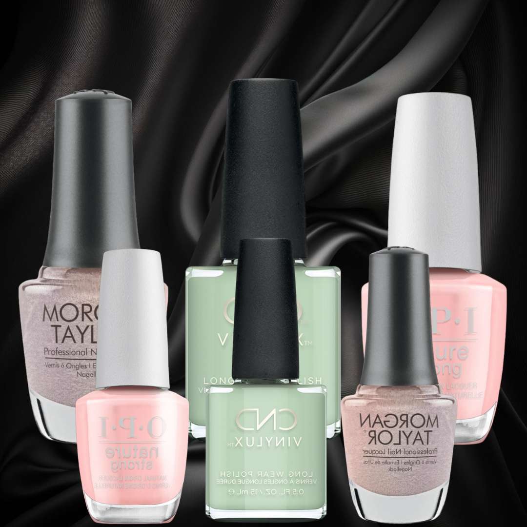 Set of nail polish bottles with visible brand names against a dark background