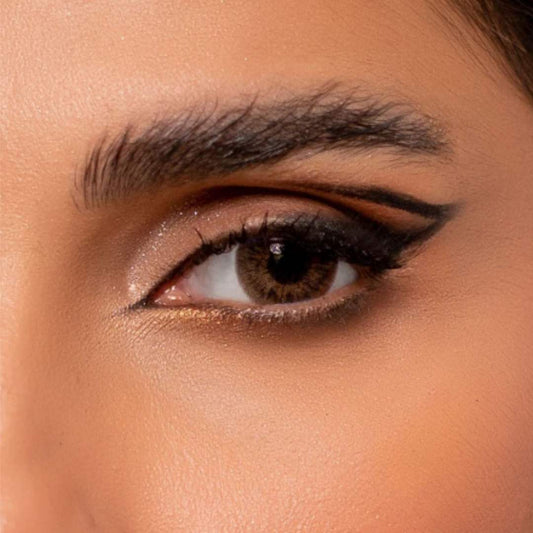 Close-up of a woman's eye with rainbow_brown_contact_lenses