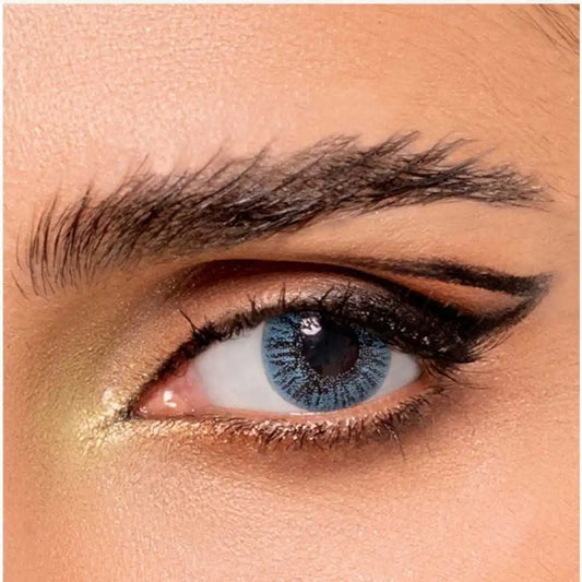 Close-up of a blue eye with sky blue basic cotact lense