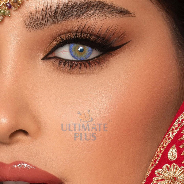 Close-up of an eye wearing sky blue contact lenses of ULTIMATE PLUS 3-in-1 colour  Bridal Eye lenses